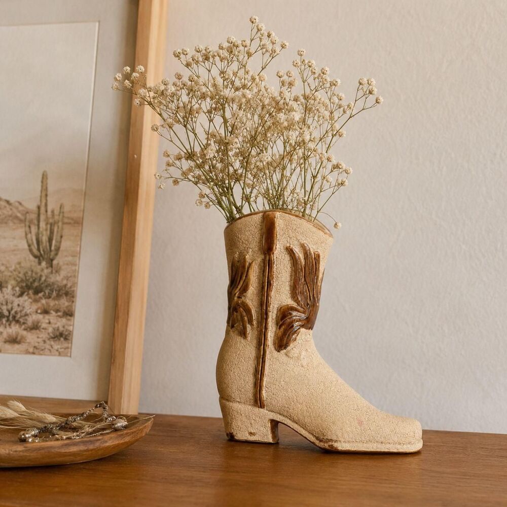 Vintage ceramic cowboy boot vase with a rustic tan and brown glaze 7.75"
